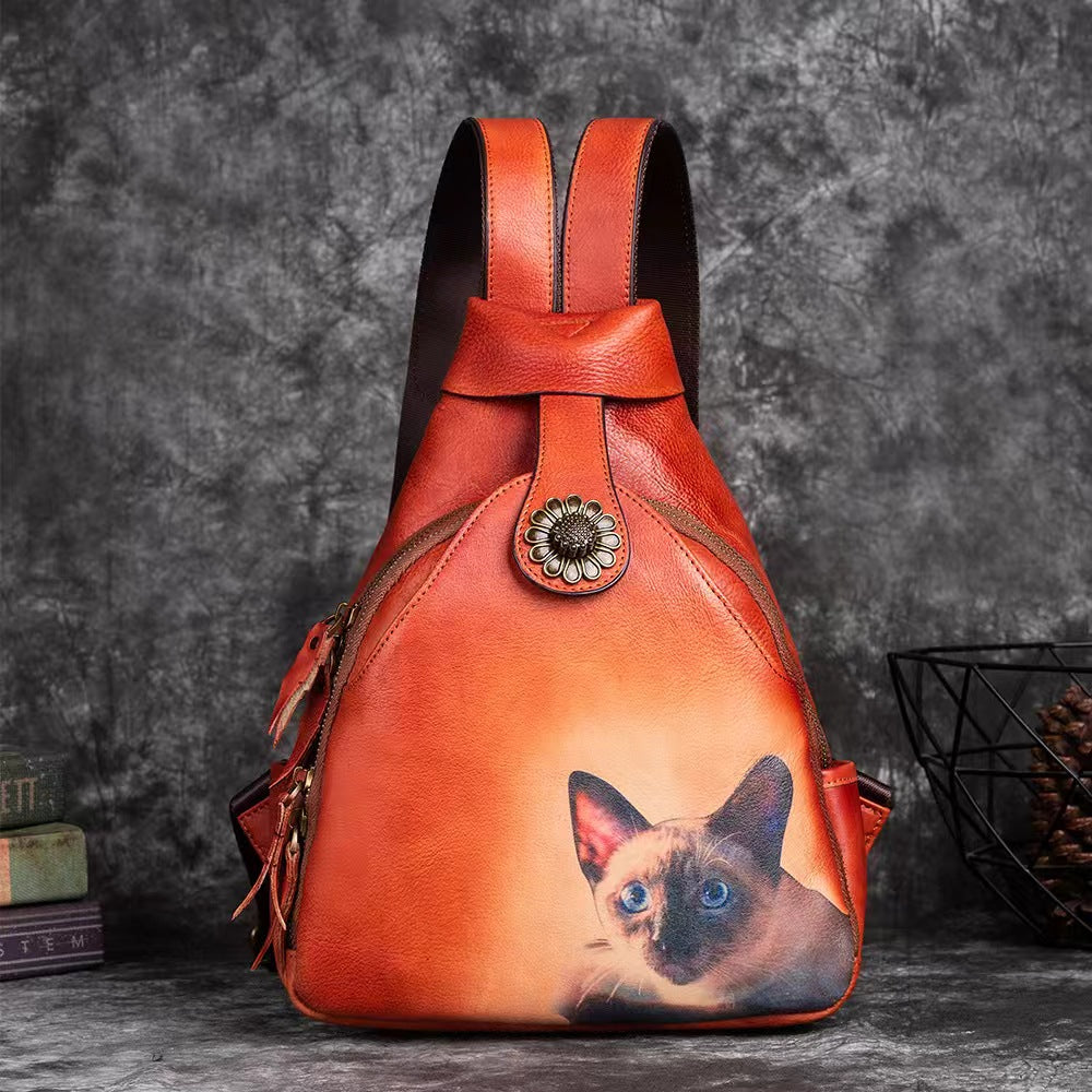 Vintage backpack with small cat design