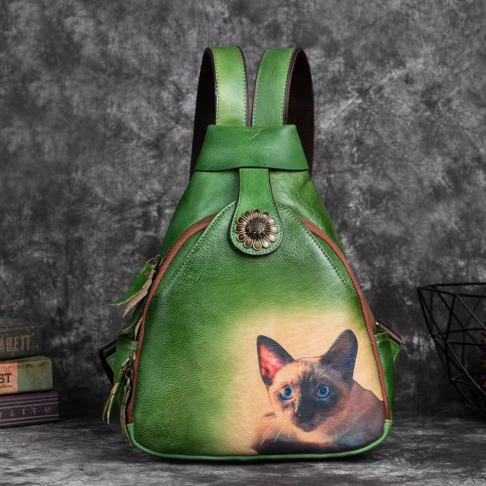 Vintage backpack with small cat design