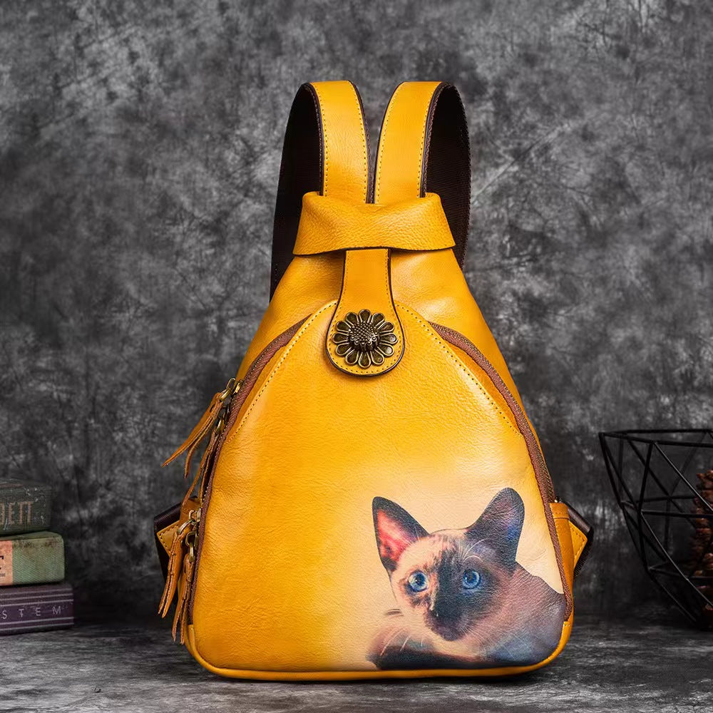 Vintage backpack with small cat design