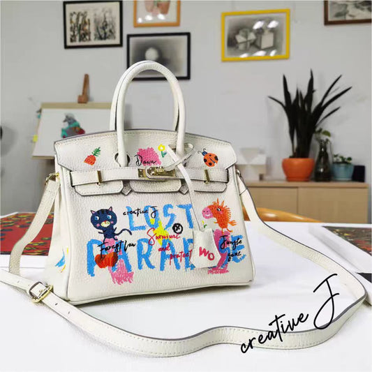 Handmade Birkin-style bag made of grained leather with hand-painted pattern of a lost paradise