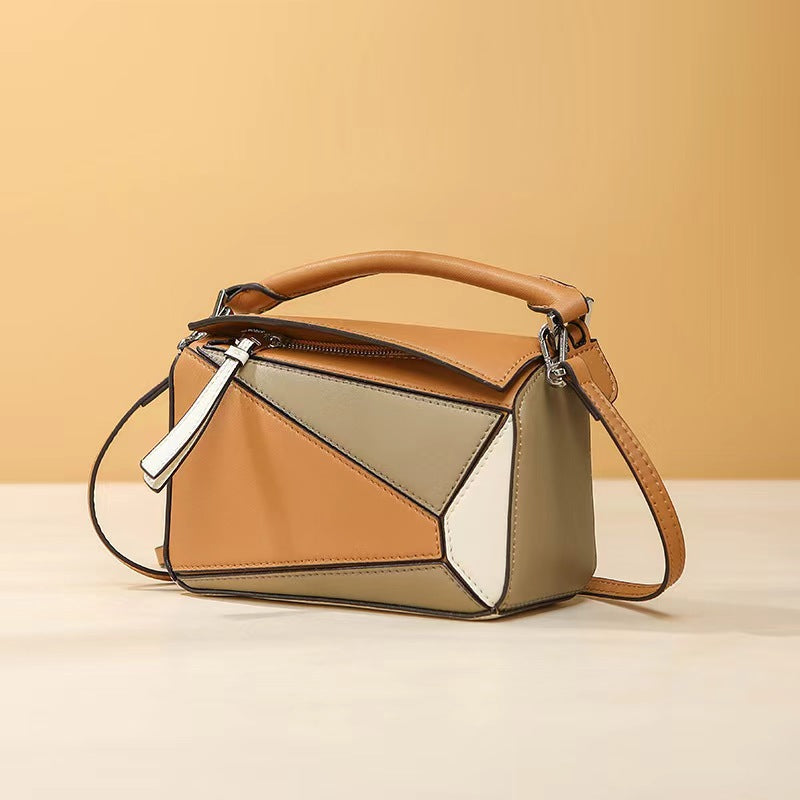 Moderne Damen Leder Umhängetasche in Bicolor Geometrie von RHYRGWEK